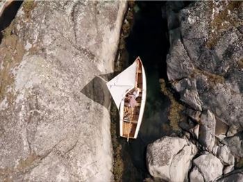 How does this guy fit his boat through there!? - Sailing News