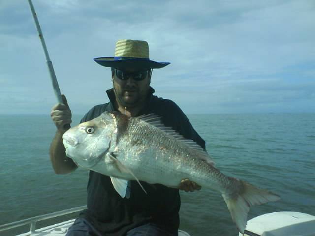 my brother and i with 2 moretonbay snapper
