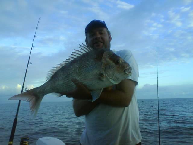 my brother and i with 2 moretonbay snapper