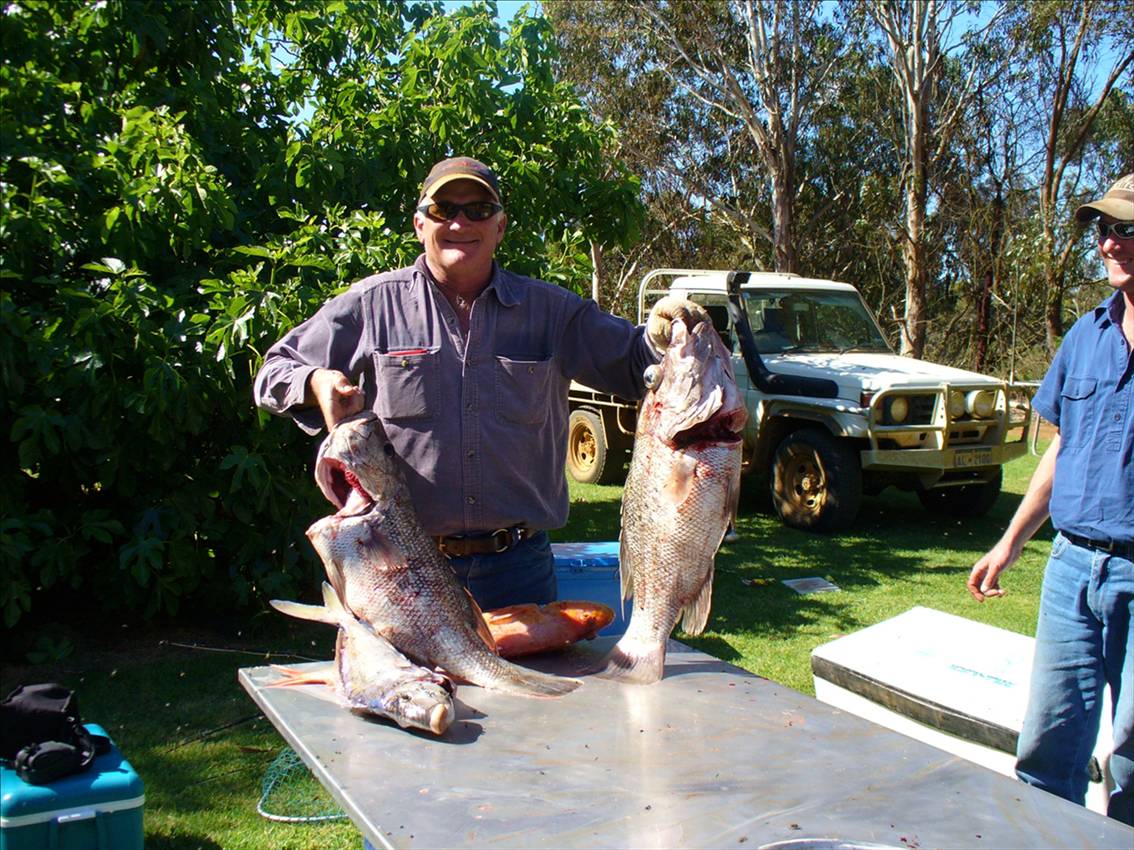 BL HOLDING HIS DECKY\`S  FISH