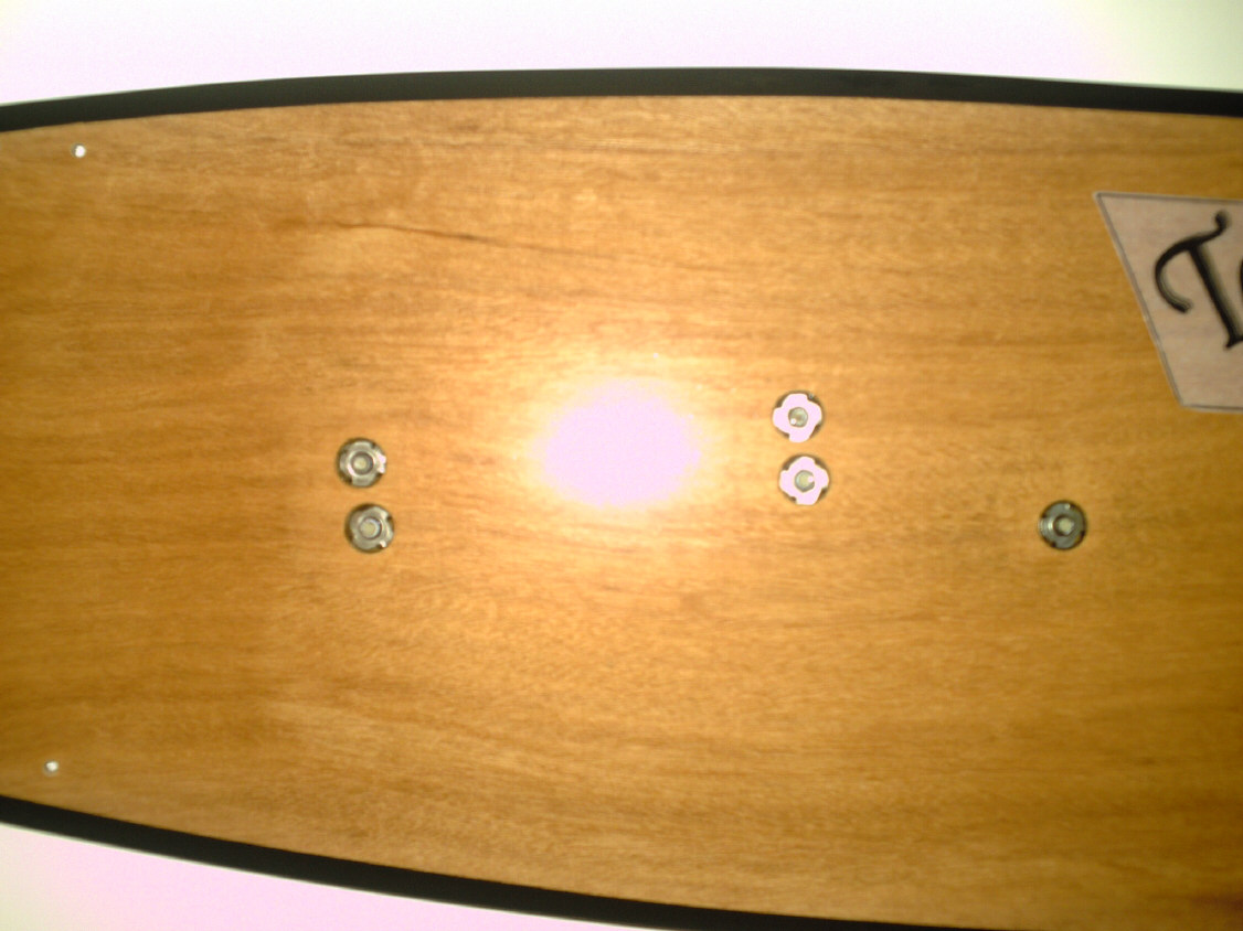 Tee Nuts Epoxied Into Board Top
