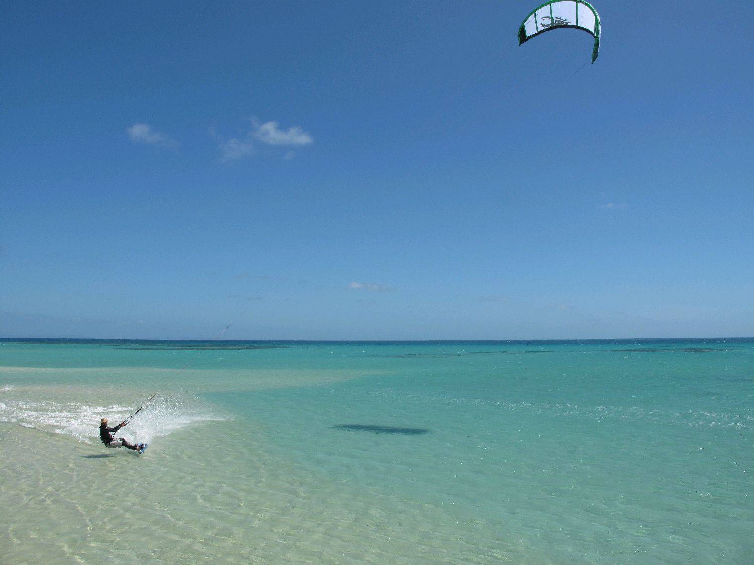 Flat clear water and miles of it right in the wind belt off Port Douglas