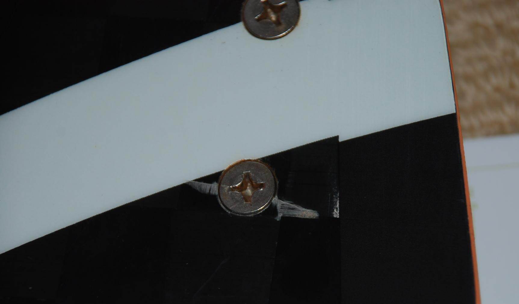 2010 Select, cracking around fin screw