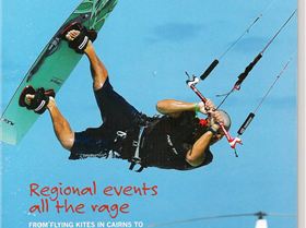 Paul jackson on cover QLD toursim Mag. Photo taken carins kite week 2005. Angie