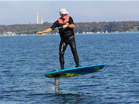 Boat foiling with kite board