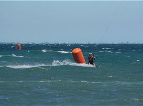 Kite X - Neil rounding the buoy in Bay 2