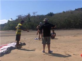 Damo our Fijian boat driver Helps Tony do lines