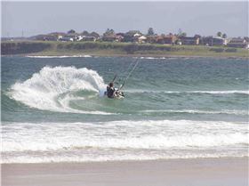 screw paddling onto a wave