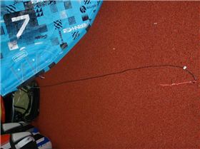 Single line attachment for back lines