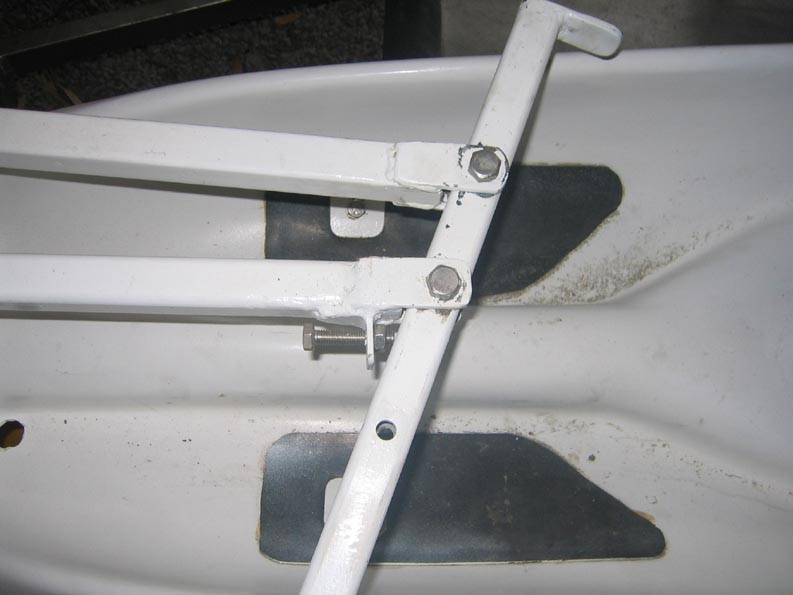 Adjustable steering end stop