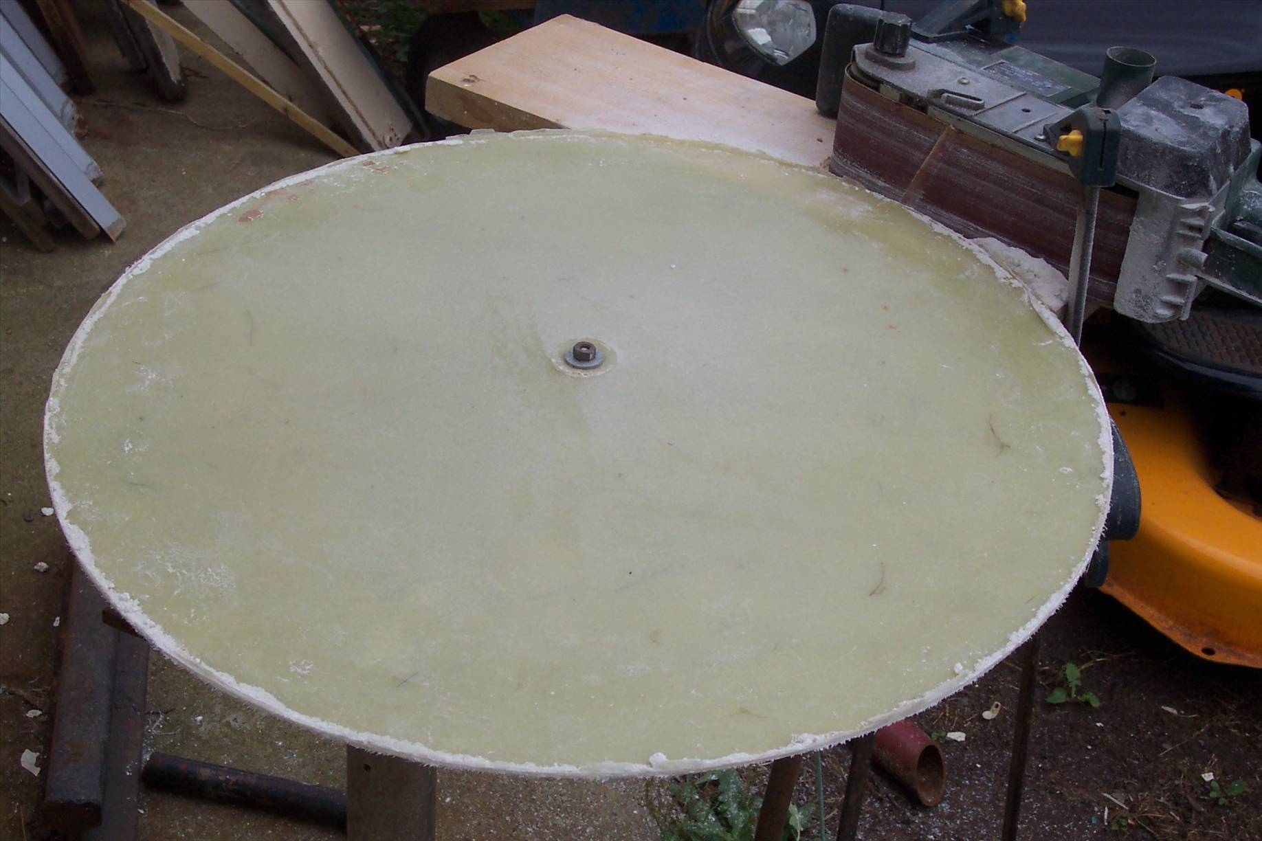 Rim on jig to get true outside diameter.