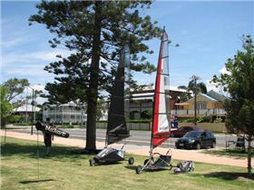 The 2008 Pro model with black 5.5m sail and an older Pro model with red 5.5m sail.