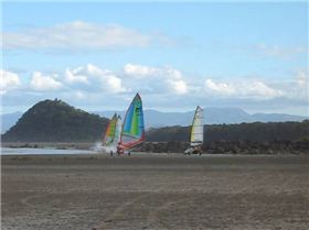 Exploring Midge Point- raceing the tide home!