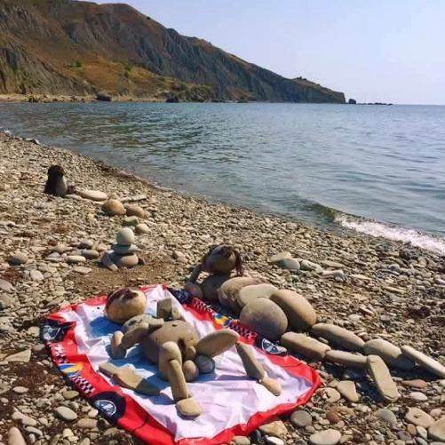 sunbathers rock