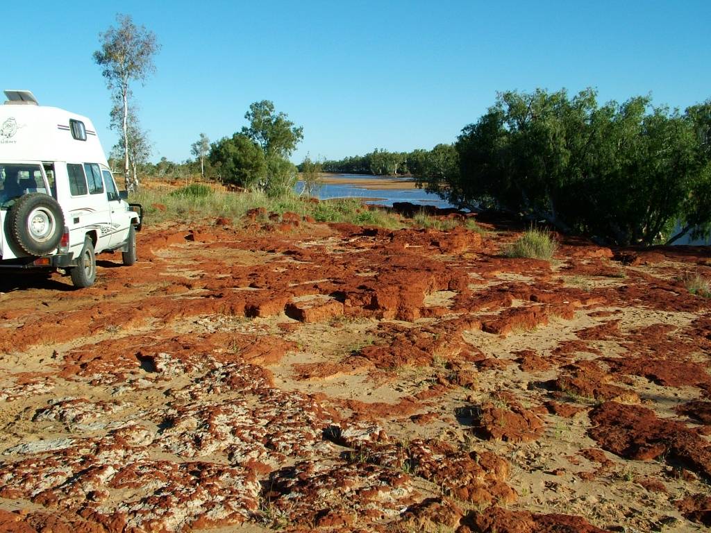 Camp by a rocky pool