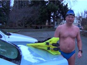 Air 30-32F (-1 to 0C), Water 42.8F (6.0C) Swim in Speedos