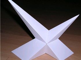 compound of two different size asymmetric pyramids