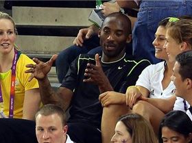 514275-kobe-bryant-chats-with-steph-rice