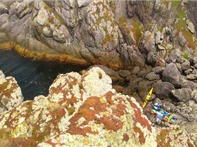 Landing 6 composite sea kayaks on Albatross Island