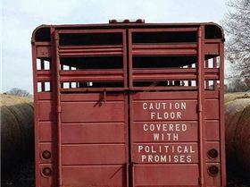 funny-cow-truck-poop-sign-politics