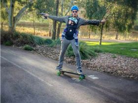baby riding electric skateboard