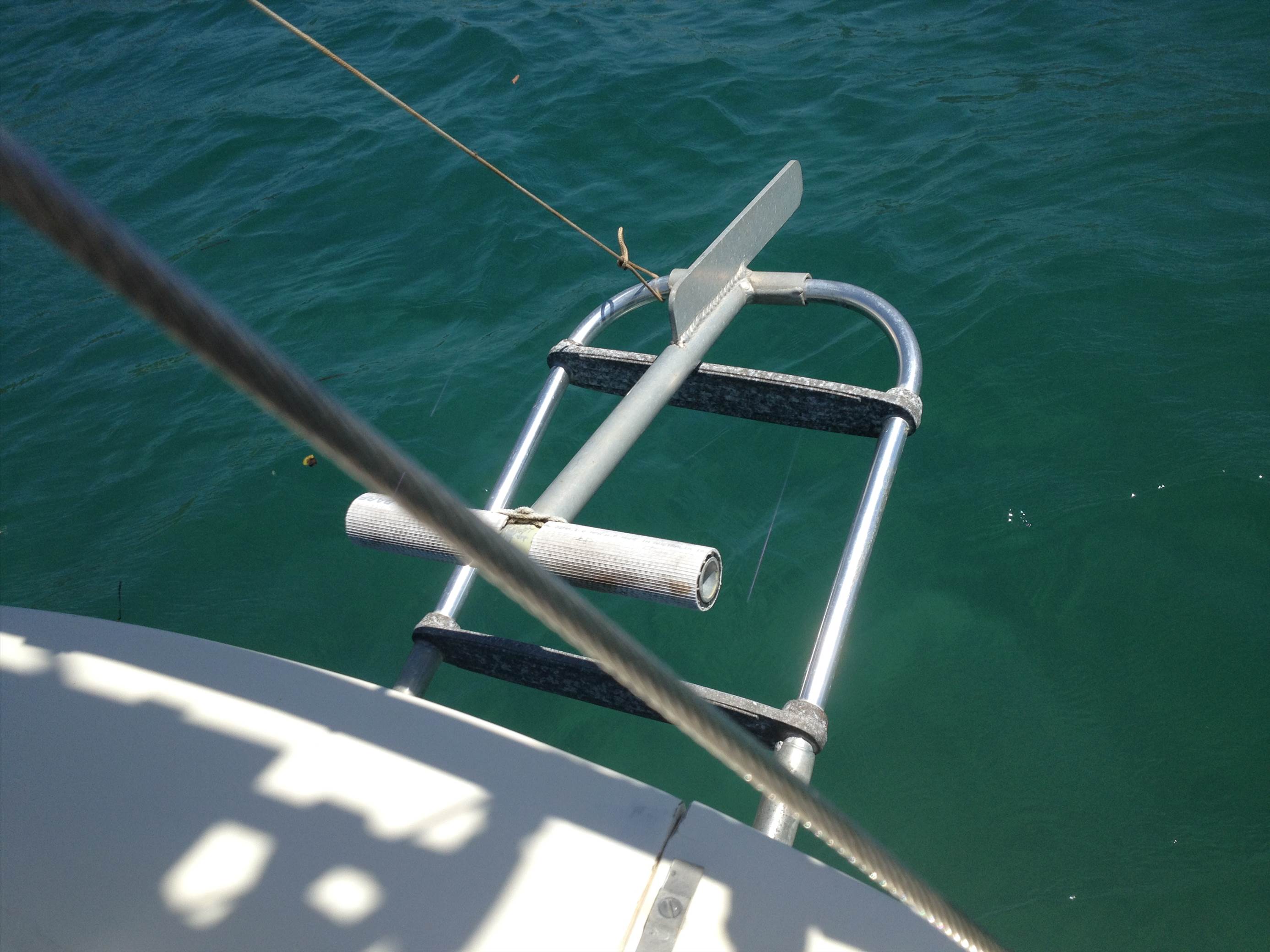 Ladder in process of being raised