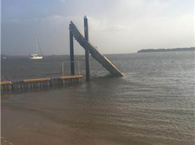 Strong winds 98kmh gusts Pintado in the back ground on her mooring