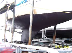Morning Bird keel, pre soda blast. It is bolted on.