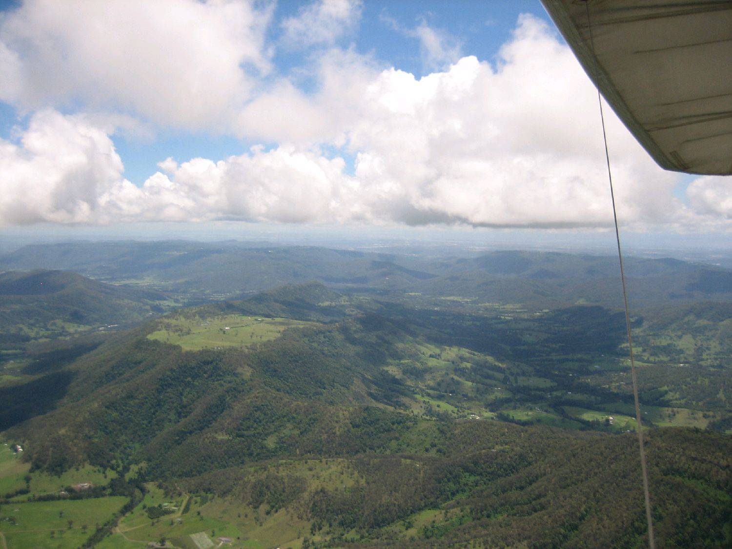 Hang gliding at cloud base