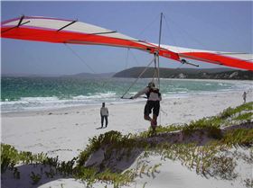 Shaun stepping off another dune