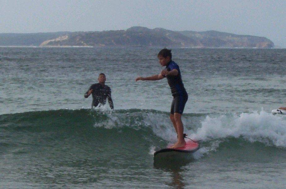 James & Gra surfing