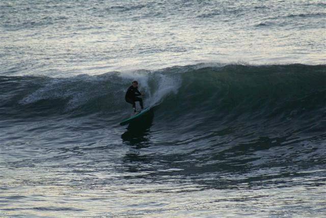 casso and dan paddle boarding