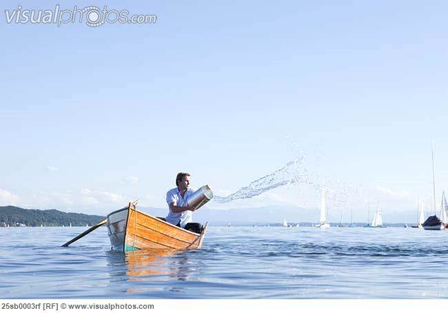 throwing buckets of water ot ouf boat 25sb0003rf