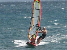 SUP sailing with passenger