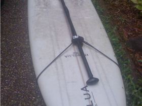 hold paddle to board