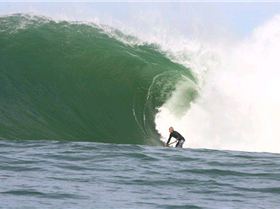 Jamie Mitchell charging on a SUP