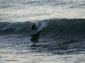 casso and dan paddle boarding