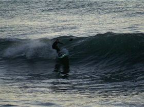 casso and dan paddle boarding