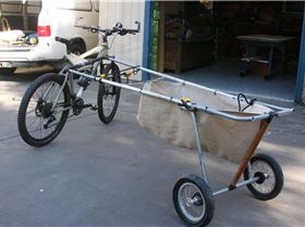 converted pram with  telescopic side arms....ali poles from camp shop......from kite to  sup.....