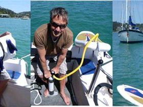 Pumping up my Red Air paddleboard while on the boat