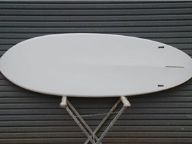 Phil with his 8'10" x 33.5" x 150 ltr timber deck Fun Board SUP