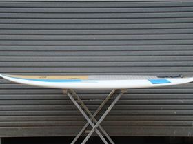 Phil with his 8'10" x 33.5" x 150 ltr timber deck Fun Board SUP