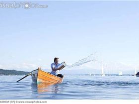 throwing buckets of water ot ouf boat 25sb0003rf