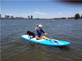 Daughter and dog on a hot day