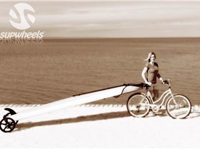 Surf board, SUP board or Kayak with a bike.