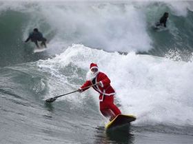potd-surfing-santa 3112703k