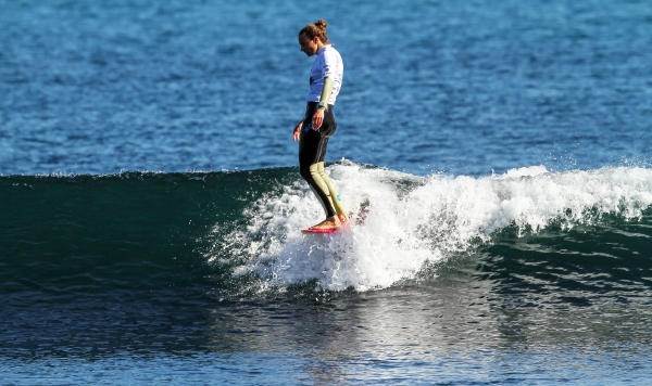 Georgia Young surfing surfer