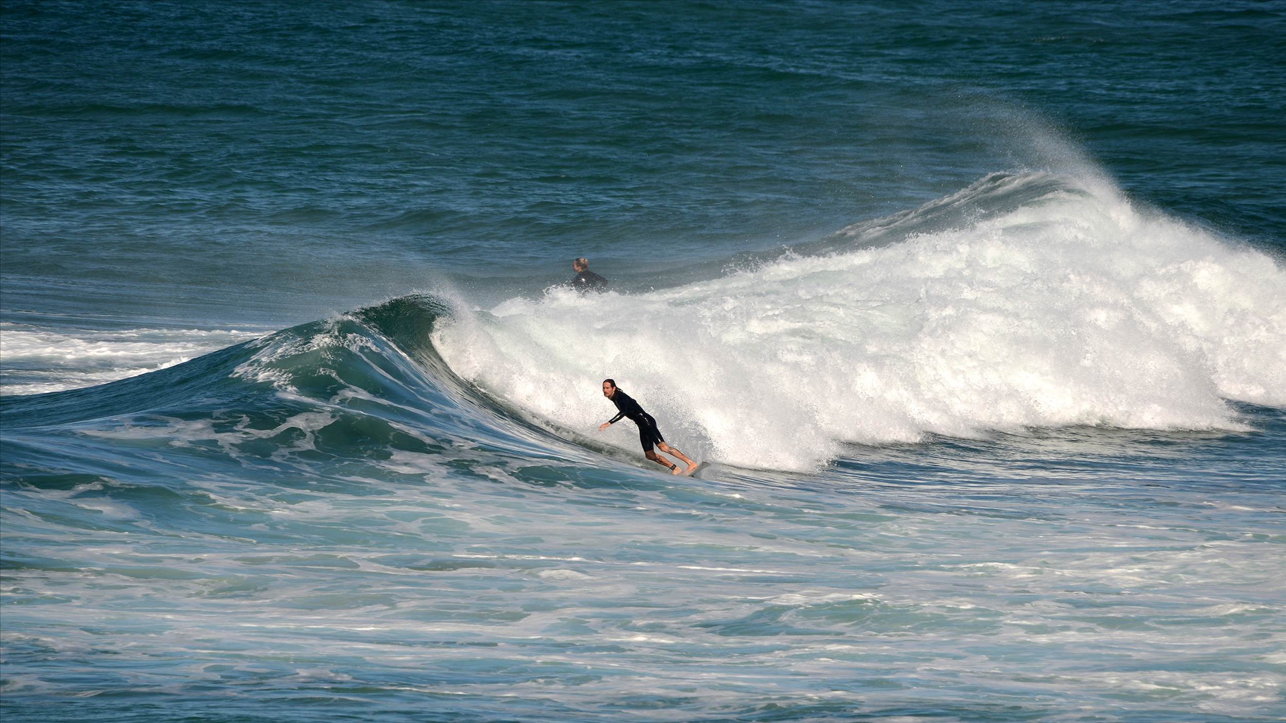 Surfers at Dreamtime Beach