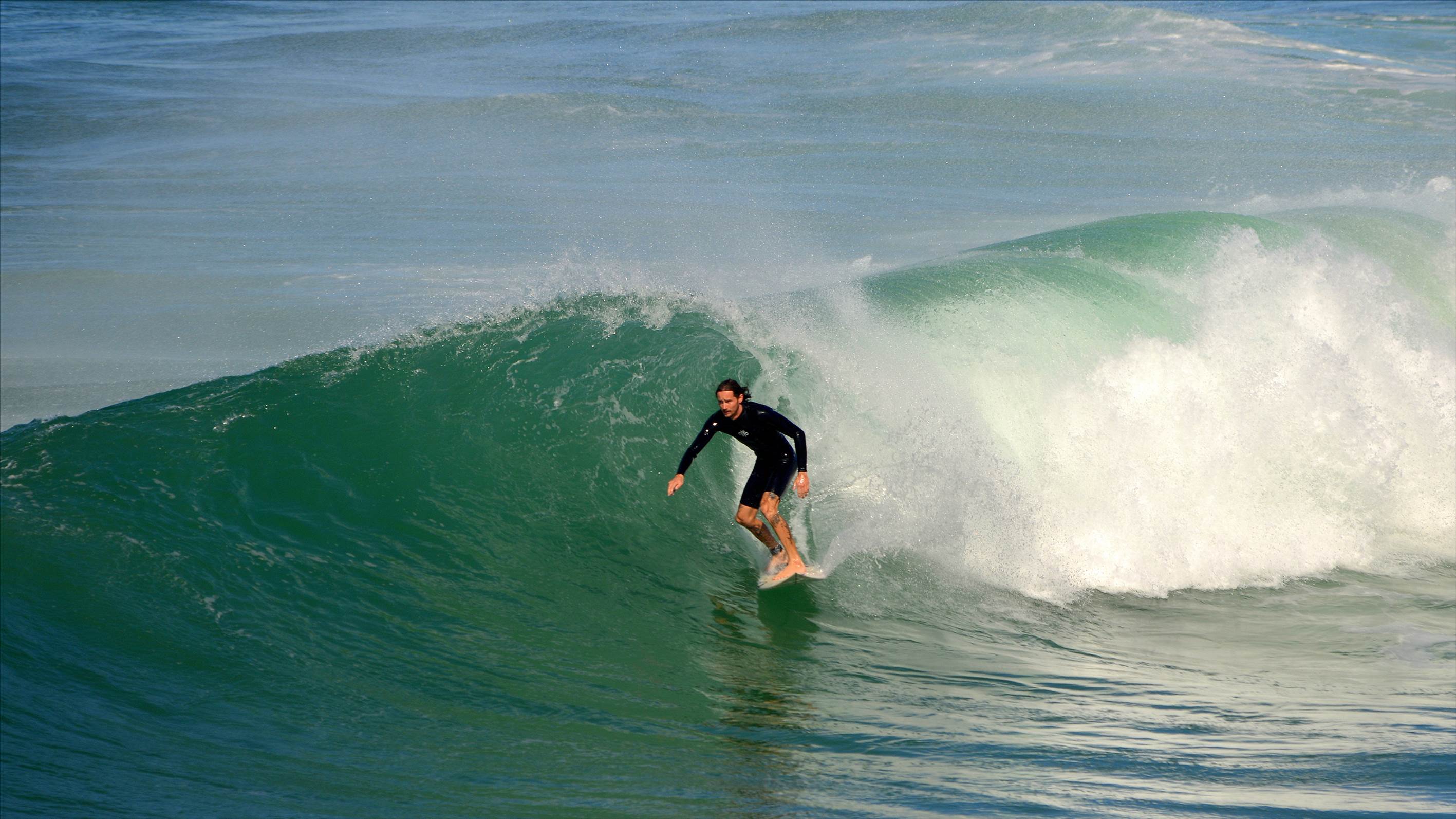 Surfers at Dreamtime Beach