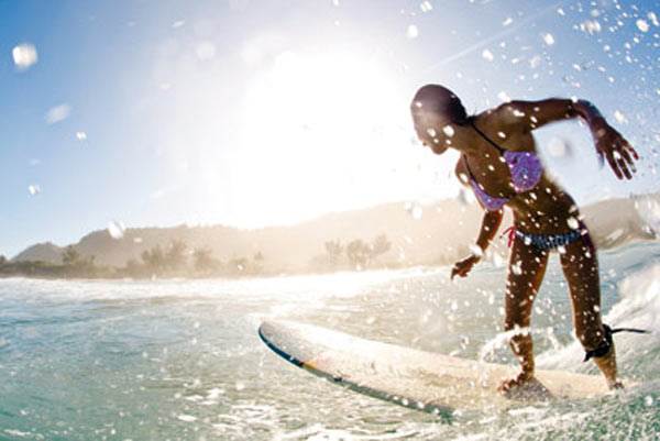 girl-longboarding-surf